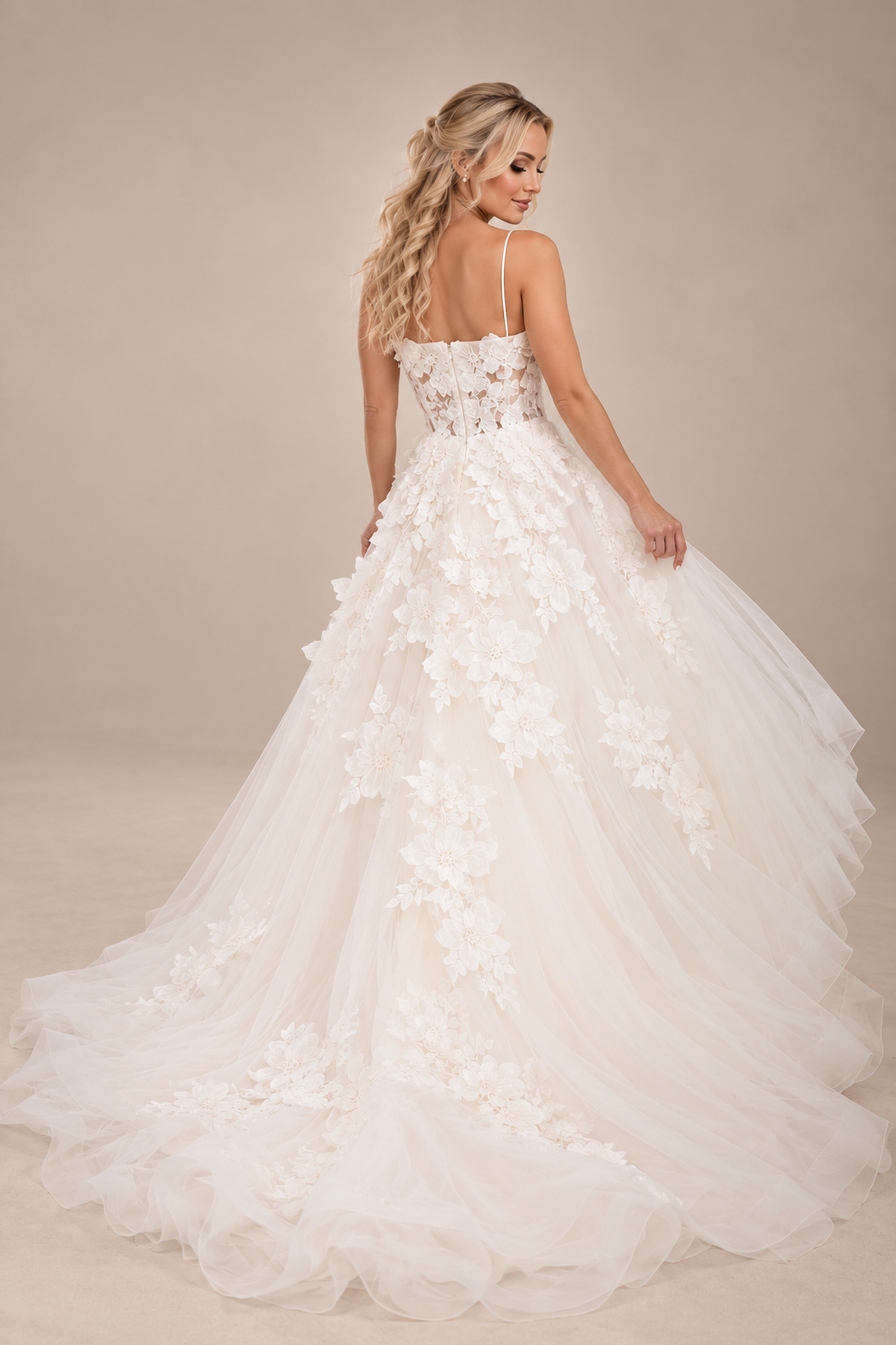 JOLENE A timeless mermaid wedding dress featuring a beautifully detailed lace bodice with a deep illusion V-neckline and delicate beaded straps. The sleek fitted silhouette flows effortlessly into a soft flared skirt and graceful lace-edged train