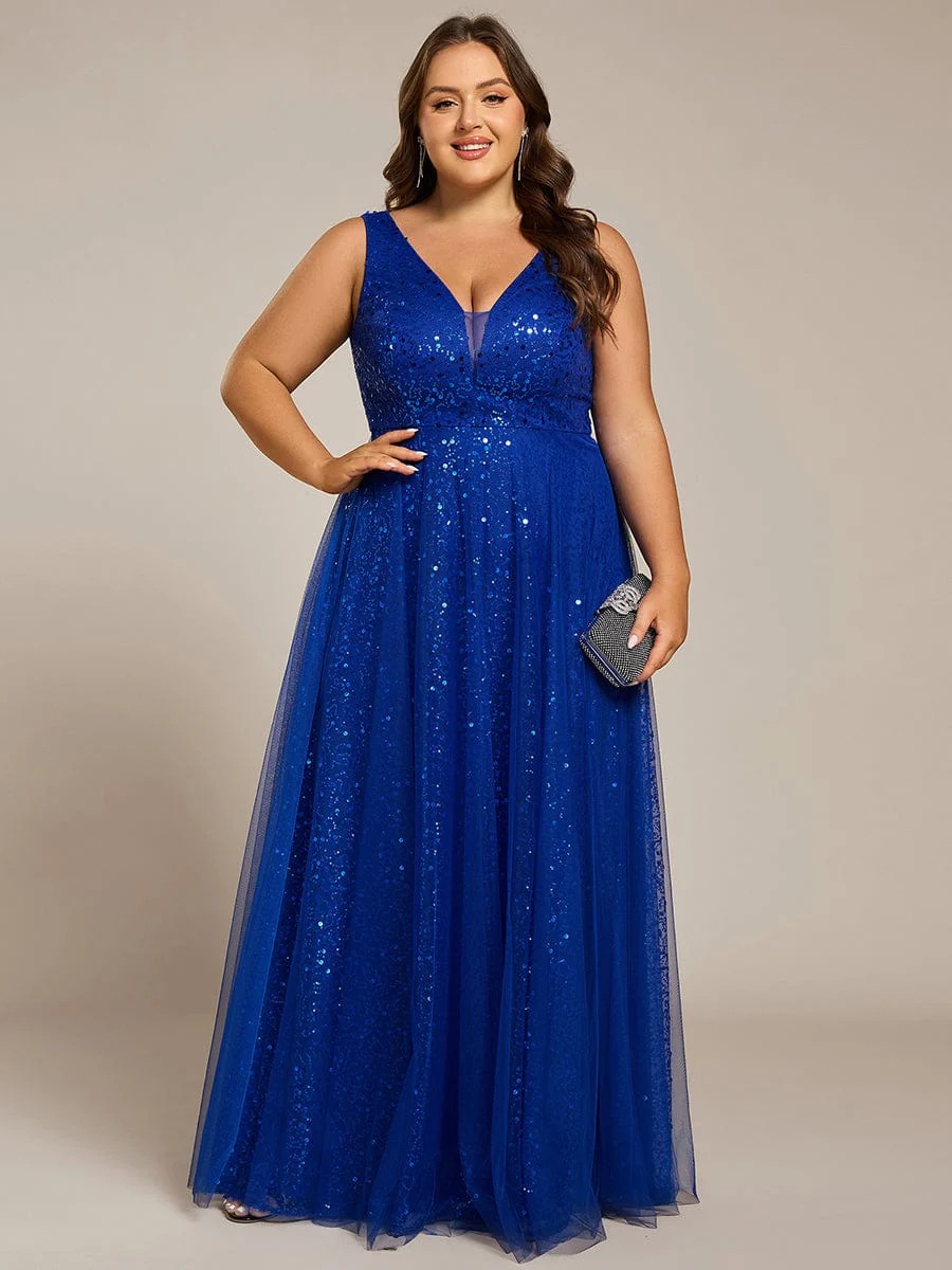 The perfect blend of elegance and allure, this V-neck evening dress boasts a high waist and sheer sequined tulle fabric, accentuating your figure beautifully.