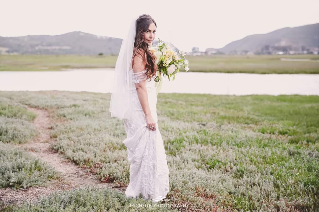 bianca Looking for a wedding gown as unique and beautiful as your love story? ✨  Introducing our stunning off-the-shoulder blush wedding gown, where romance meets sophistication. 🌸 With intricate beaded lace that flows gracefully over a sleek sheath silhouette, this gown exudes pure elegance. The plunging sweetheart neckline and detachable draped lace sleeves combine to create a perfect balance of timeless and modern beauty. 💍  ✨ Design Highlights:  ✔ Plunging sweetheart neckline – Soft and romantic, highlighting your décolletage. ✔ Sheath silhouette with intricate beaded lace – Flattering, with beautiful details that shimmer in the light. ✔ Detachable lace sleeves – Add an elegant touch or go sleeveless for a sleek, modern look. ✔ Customizable fit – Meticulously tailored to your exact measurements, ensuring a flawless fit. ✔ Color choice – Available in any color you desire, for a gown that's truly yours.  💫 Customization Options: ✅ Tailored to your exact measurements for a perfect fit. ✅ Choose from a range of colours to suit your style. ✅ Select a long or short train to match your vision. ✅ Personalize with short or long sleeves for a versatile touch. ✅ Add a slit for a bold look, or opt for a sleek, classic style.  📞 Custom orders available now! 📧 info@bestersbridal.co.za | 📱 084 268 1354