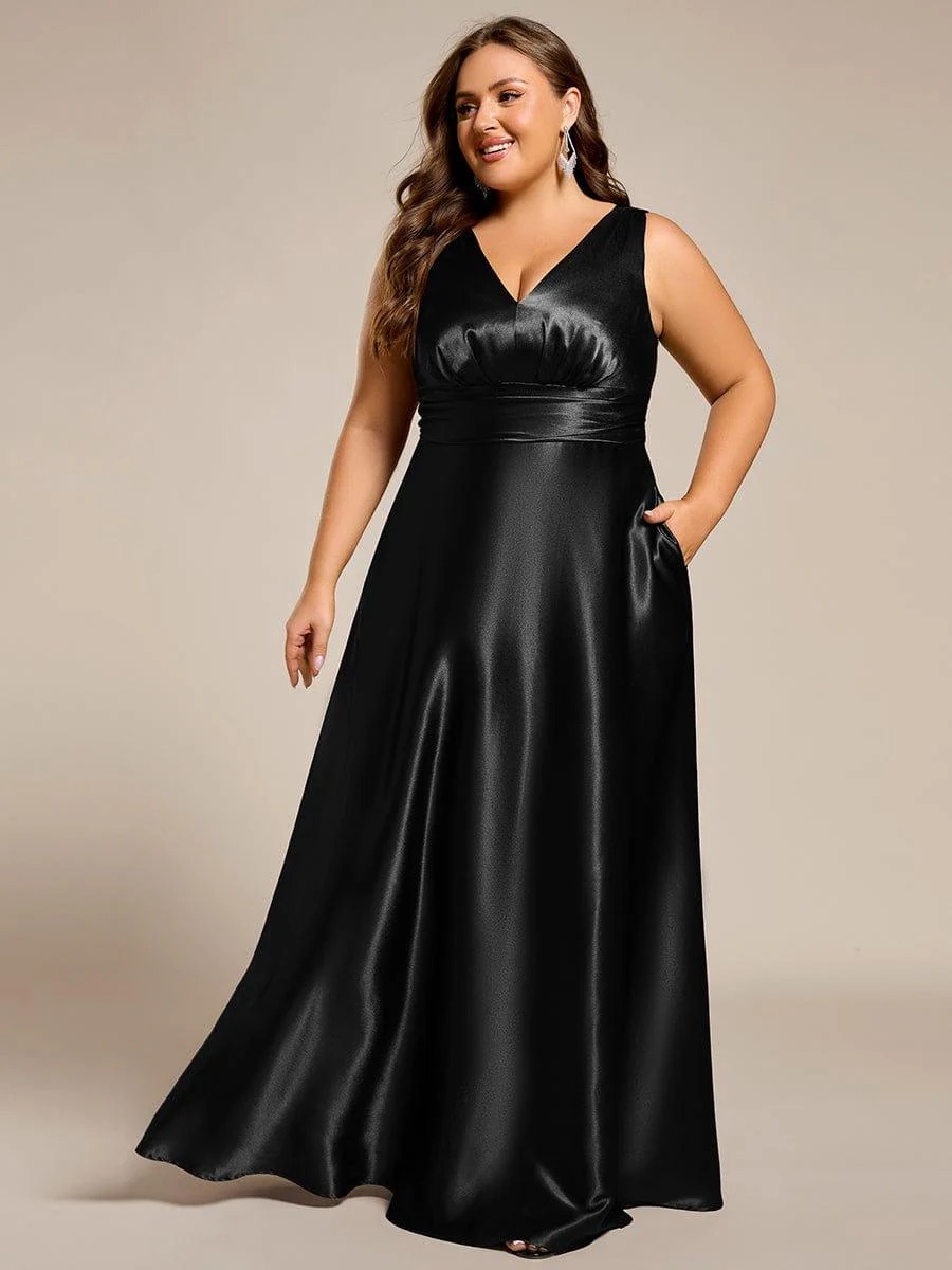 This plus-size satin maxi bridesmaid dress offers a blend of comfort and elegance. The empire waist design flatters every figure, while the soft satin fabric creates a smooth, luxurious look. Convenient side pockets add a practical touch, making it perfect for weddings and formal events where both style and functionality are key.