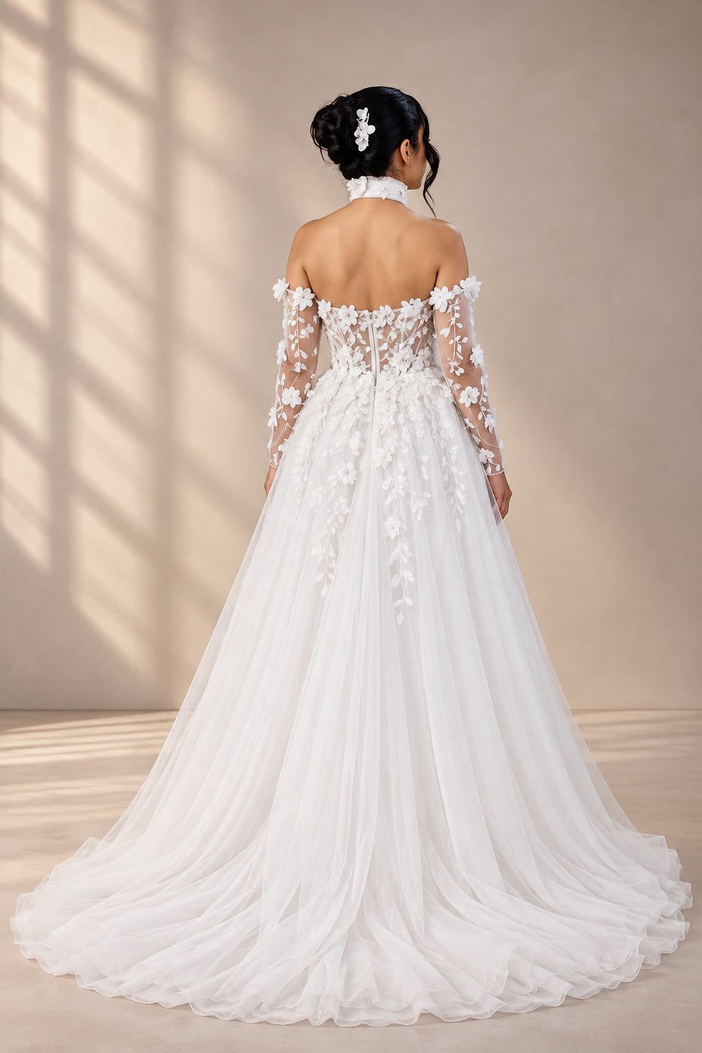 JOLENE A timeless mermaid wedding dress featuring a beautifully detailed lace bodice with a deep illusion V-neckline and delicate beaded straps. The sleek fitted silhouette flows effortlessly into a soft flared skirt and graceful lace-edged train