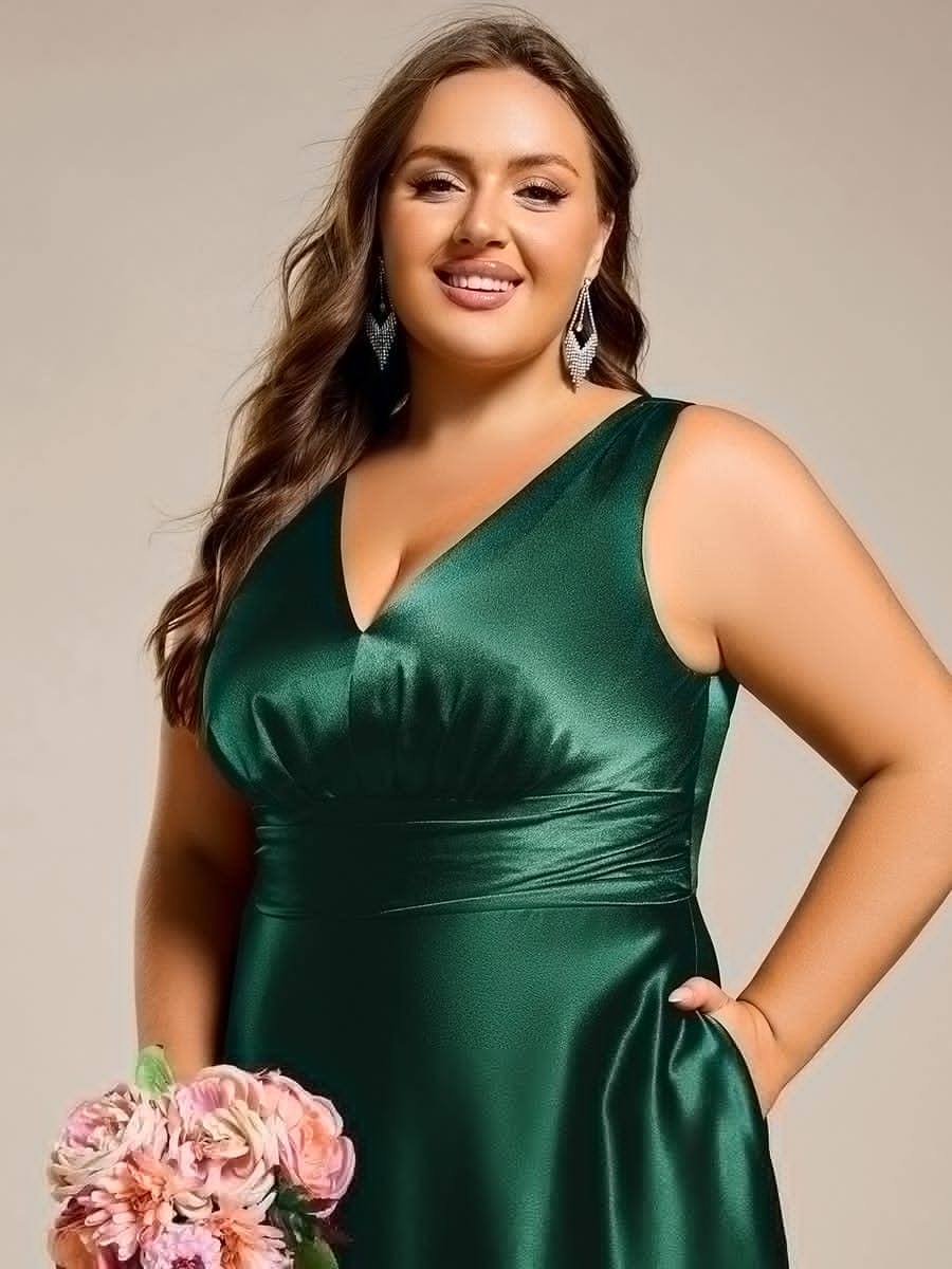 This plus-size satin maxi bridesmaid dress offers a blend of comfort and elegance. The empire waist design flatters every figure, while the soft satin fabric creates a smooth, luxurious look. Convenient side pockets add a practical touch, making it perfect for weddings and formal events where both style and functionality are key.