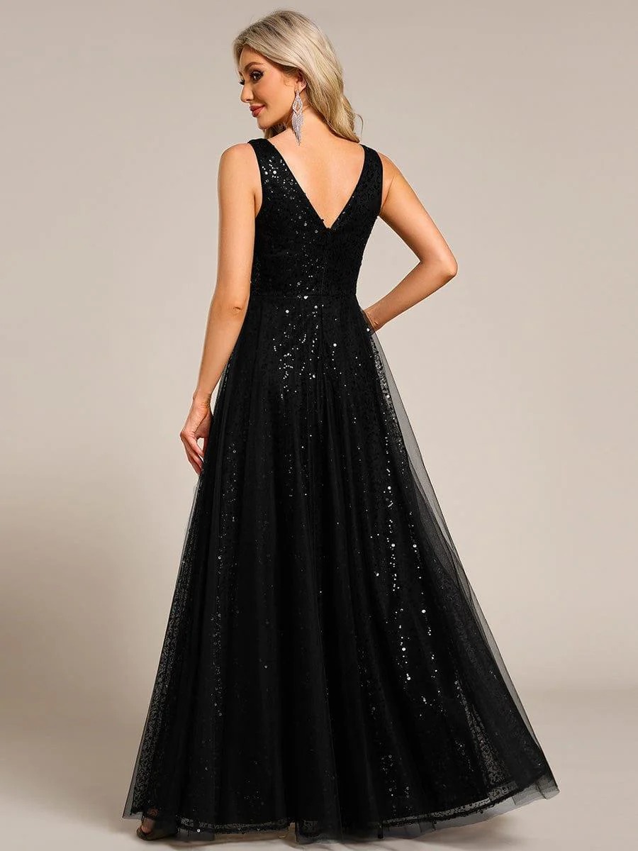 The perfect blend of elegance and allure, this V-neck evening dress boasts a high waist and sheer sequined tulle fabric, accentuating your figure beautifully.