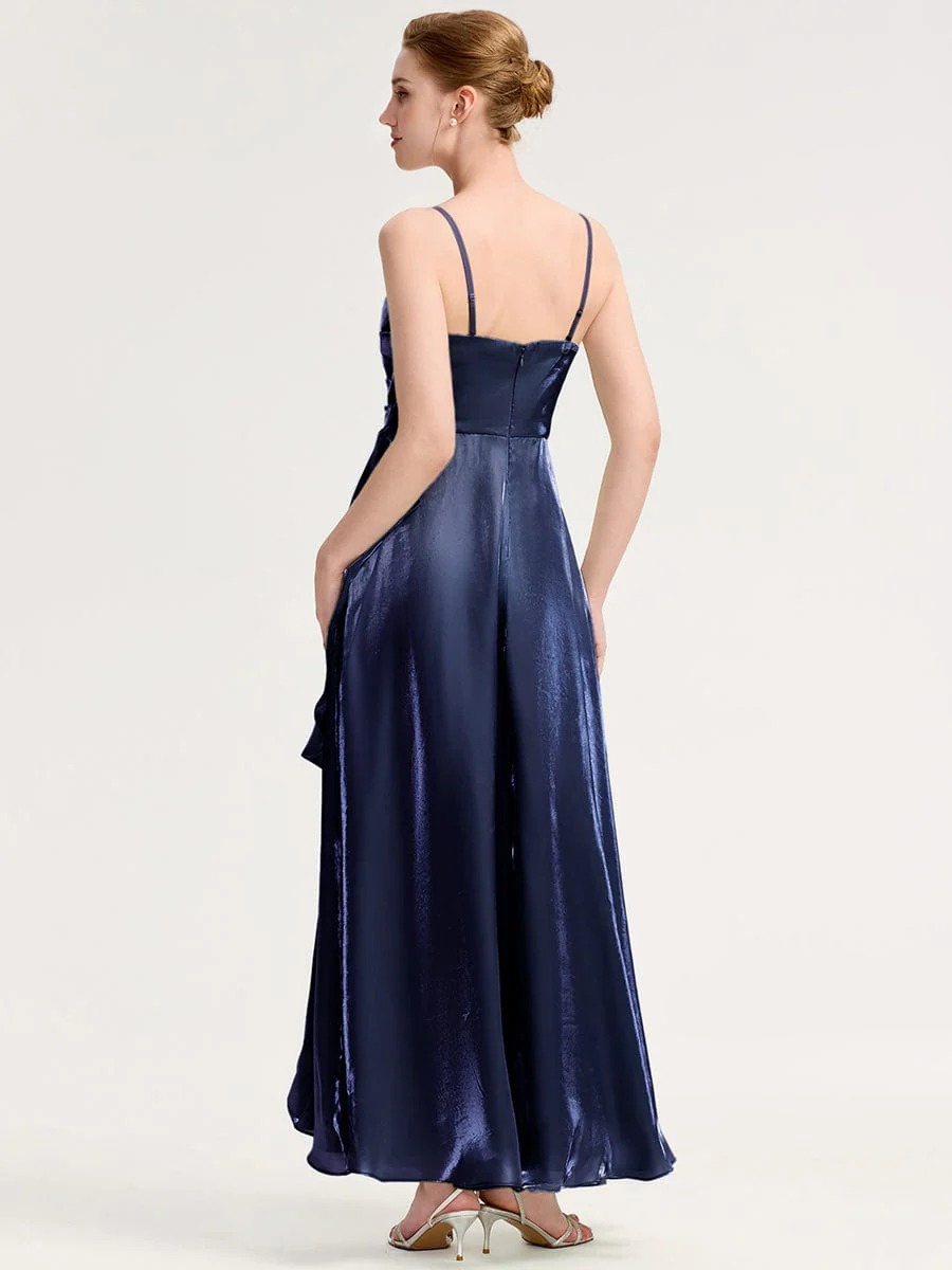 Elevate your evening style with this stunning green satin dress. Featuring a flattering silhouette, delicate spaghetti straps, and an elegant front slit, it offers both sophistication and comfort. The iridescent fabric catches the light beautifully, making it perfect for formal events or special occasions. Pair it with your favorite accessories for a complete look.
