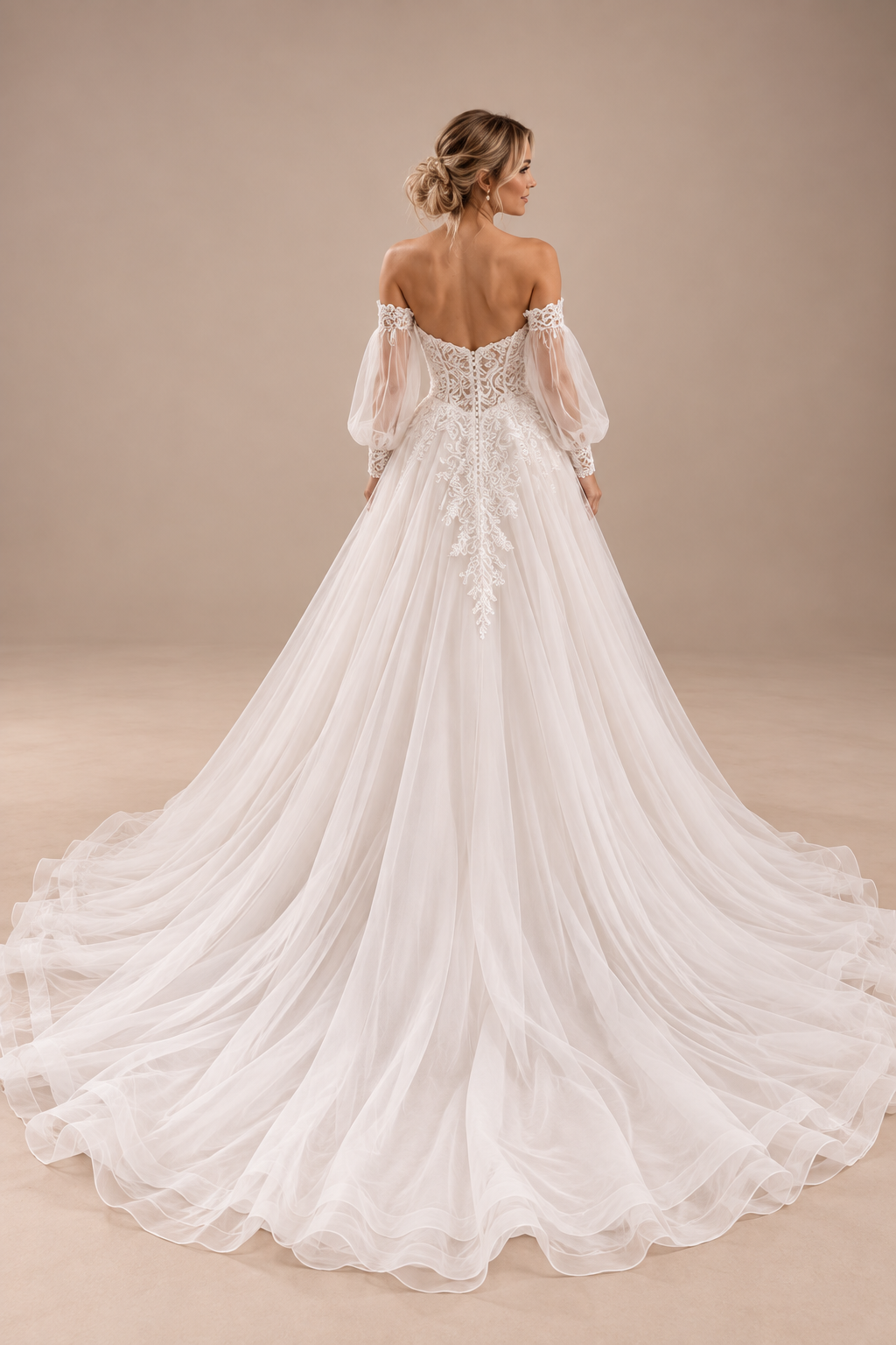 JOLENE A timeless mermaid wedding dress featuring a beautifully detailed lace bodice with a deep illusion V-neckline and delicate beaded straps. The sleek fitted silhouette flows effortlessly into a soft flared skirt and graceful lace-edged train