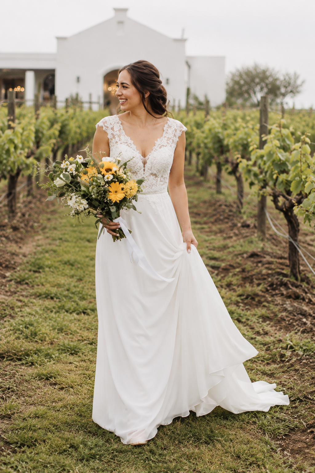 URSULA Elegant fitted crepe gown with a lace sweetheart bodice, flattering ruching, thigh-high slit and graceful train.