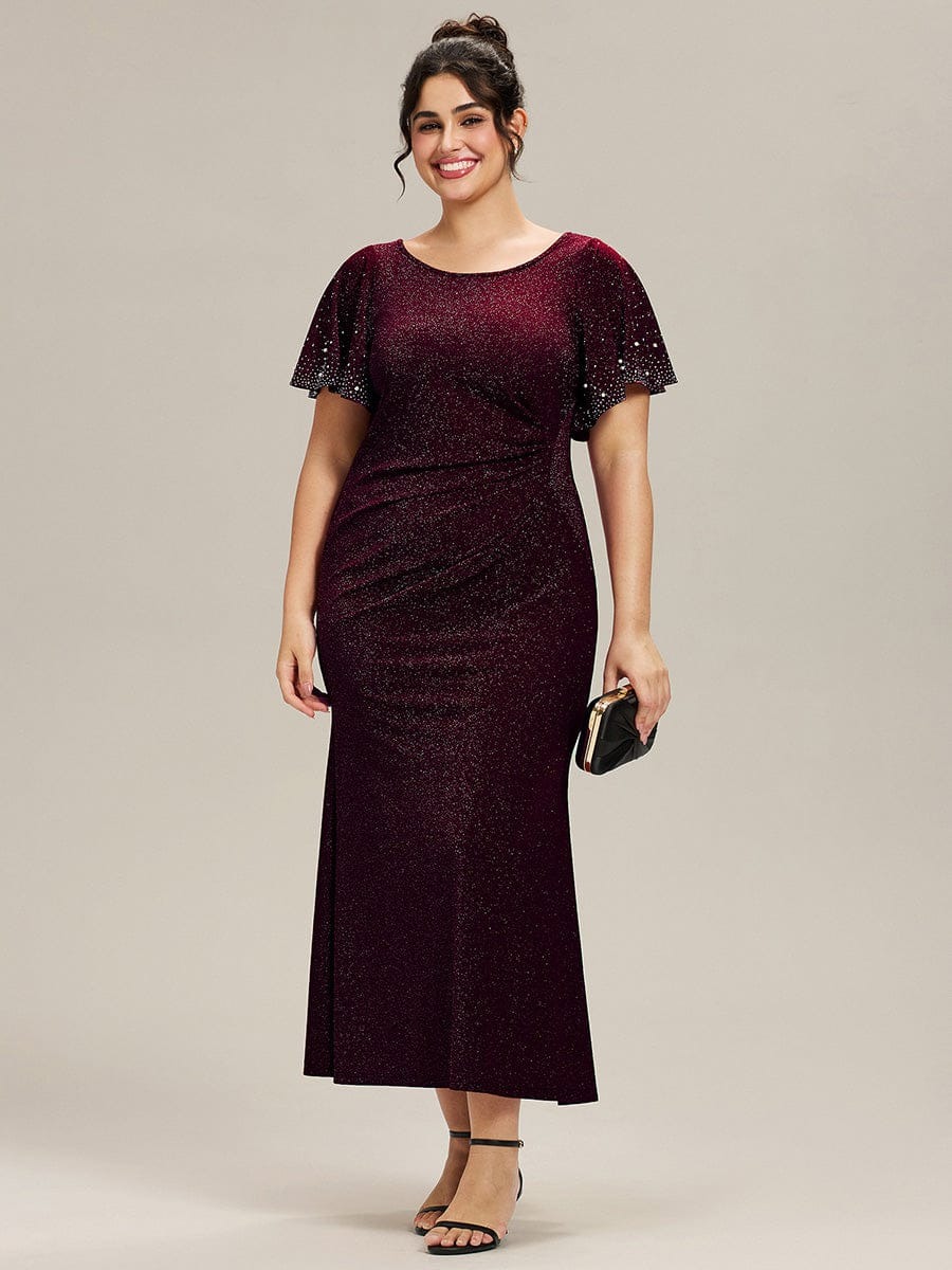 Fate A glamorous formal gown adorned in shimmering sequins, featuring elegant flutter sleeves and a figure-flattering silhouette — perfect for any special occasion.  This dress is not currently in stock but is available to order.