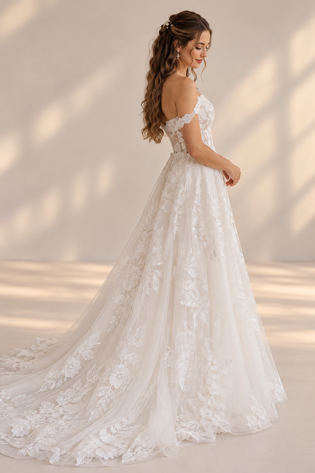 JOLENE A timeless mermaid wedding dress featuring a beautifully detailed lace bodice with a deep illusion V-neckline and delicate beaded straps. The sleek fitted silhouette flows effortlessly into a soft flared skirt and graceful lace-edged train