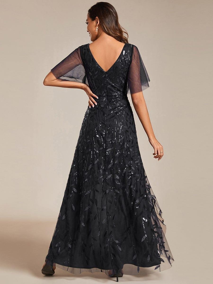Alix A chic high-low midi formal dress adorned with shimmering sequins, featuring short sleeves and a flattering V-neckline — a stylish choice for any special event.  This dress is not currently in stock but is available to order.