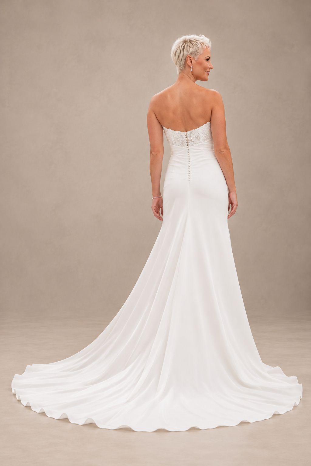 URSULA Elegant fitted crepe gown with a lace sweetheart bodice, flattering ruching, thigh-high slit and graceful train.
