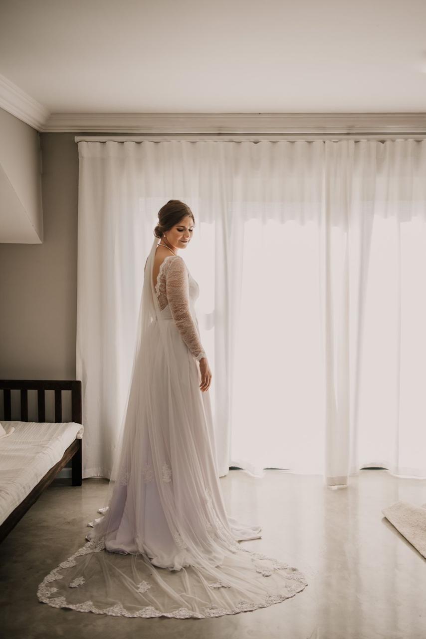 savannah Chiffon & Chantilly Lace Wedding Dress with Modern Elegance  The Savannah gown is a timeless and effortlessly elegant choice for the bride who wants soft movement and subtle lace detail. Designed with a flattering square neckline and a beautifully fitted bodice, this dress combines clean lines with delicate Chantilly lace for a look that’s both refined and romantic.  ✨ Design Highlights: ✔ Square Neckline Bodice – Structured and modern, offering a flattering silhouette with elegant simplicity. ✔ Chantilly Lace Back – Sheer lace detailing at the back bodice adds a romantic and graceful touch. ✔ Chiffon Full-Flare Skirt with Pockets – Flowing chiffon skirt that moves with ease, featuring hidden pockets for comfort and practicality. ✔ Lace Sleeves with Trim – Soft Chantilly lace sleeves trimmed with delicate lace edging for subtle detailing. ✔ Zip-Up Back – A secure closure that maintains a smooth, clean fit across the bodice. ✔ No Train / Optional Short Train – Lightweight and graceful for ease of movement and relaxed elegance.  💫 Customization Options: ✅ Custom sizing tailored to your measurements ✅ Option to change sleeve length or remove sleeves entirely ✅ Available with or without a short chiffon train ✅ Choose from soft white or off-white chiffon and lace  🌿 Savannah is designed for the bride who desires a naturally graceful gown—simple, breathable, and thoughtfully refined. 🌿  📞 Book your custom consultation today! 📧 info@bestersbridal.co.za | 📱 084 268 1354  Chiffon Skirt • Square Neckline • Chantilly Lace Back • Lace Sleeves • Pockets • Lightweight Elegance