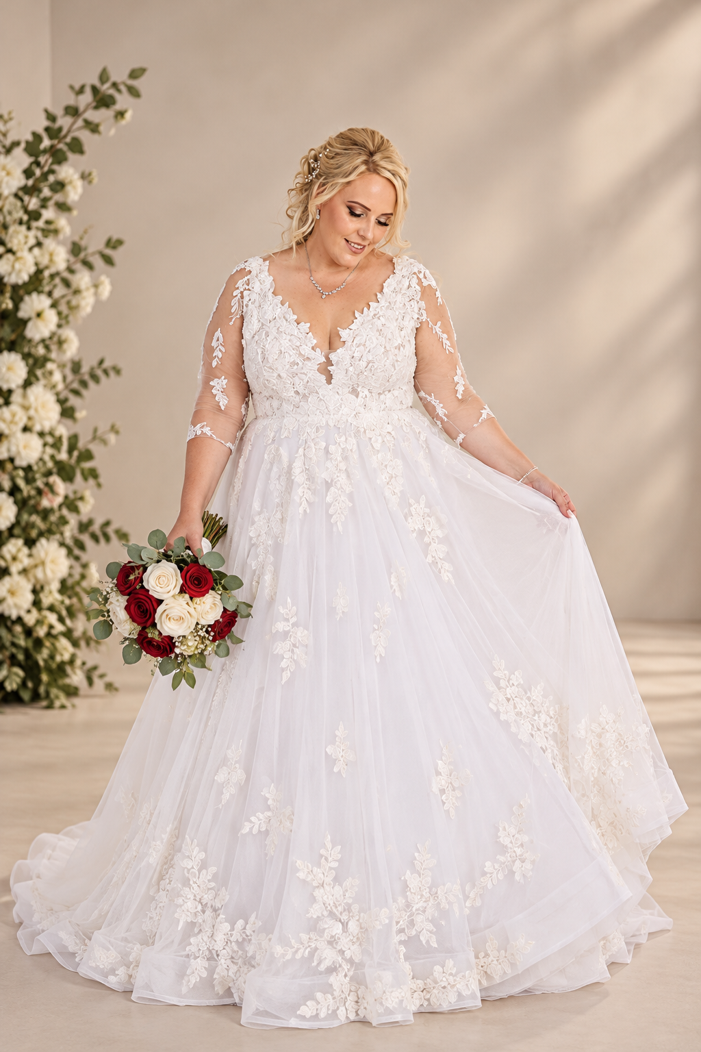 JOLENE A timeless mermaid wedding dress featuring a beautifully detailed lace bodice with a deep illusion V-neckline and delicate beaded straps. The sleek fitted silhouette flows effortlessly into a soft flared skirt and graceful lace-edged train