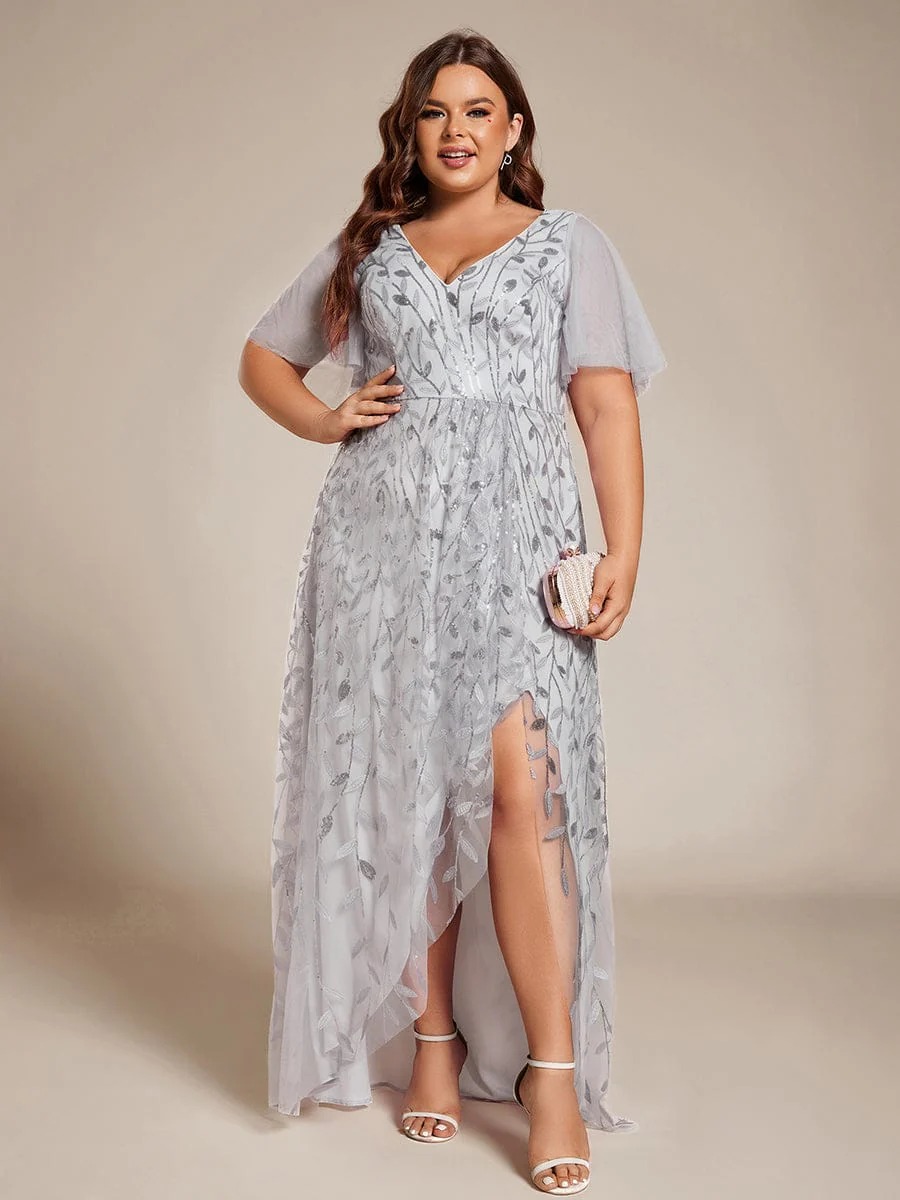 Alix A chic high-low midi formal dress adorned with shimmering sequins, featuring short sleeves and a flattering V-neckline — a stylish choice for any special event.  This dress is not currently in stock but is available to order.